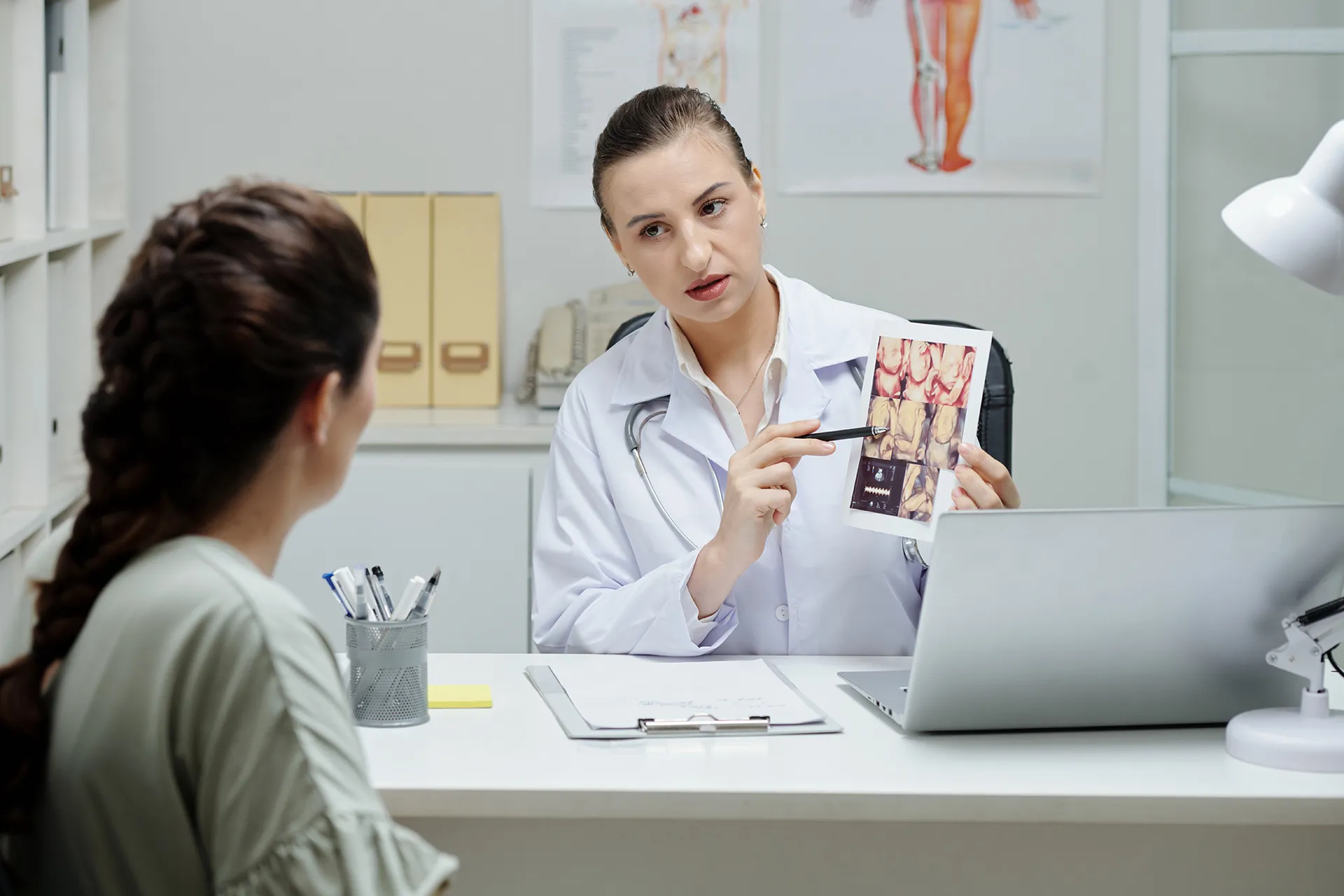 gynecologist talking to patient at office 2023 11 27 05 06 10 utc