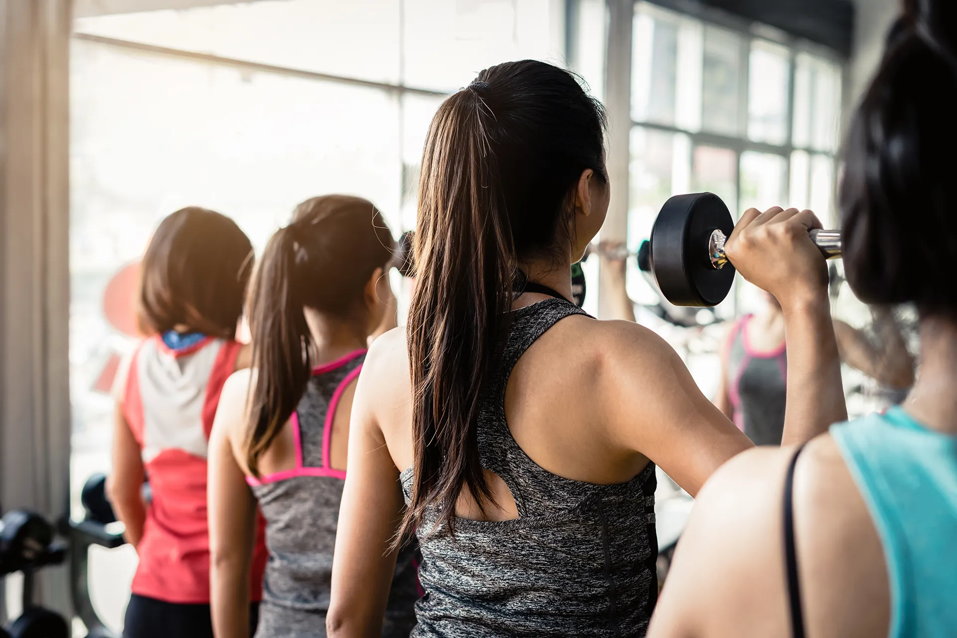 group of woman lifting weights with dumbbells 2023 11 27 05 30 58 utc